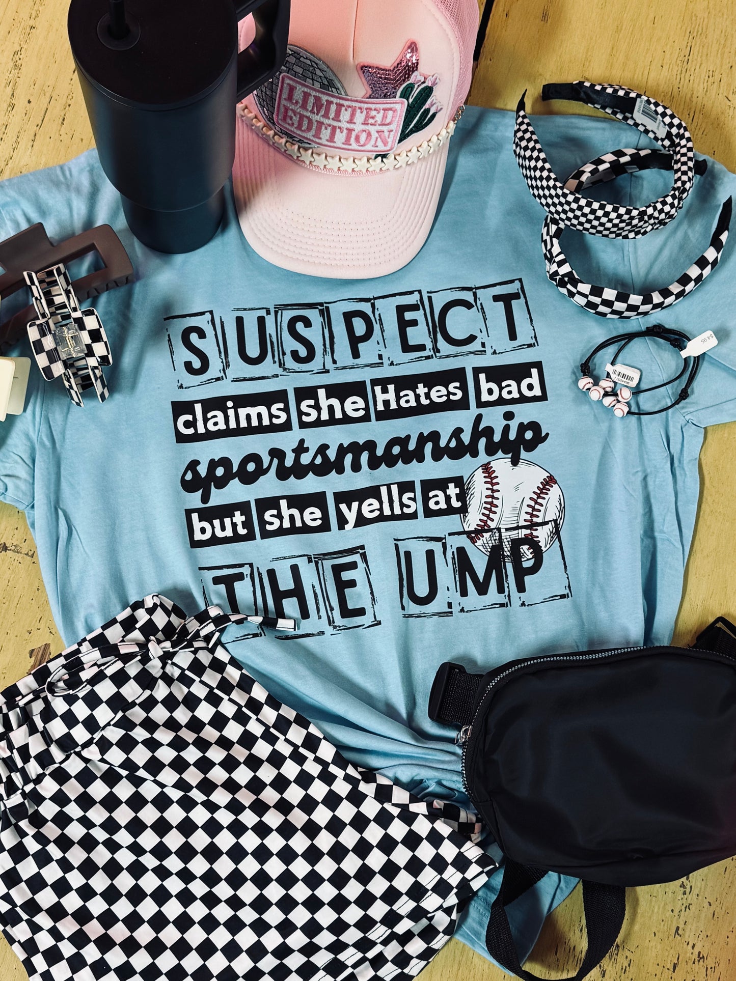 SUSPECT CLAIMS SHE HATES BAD SPORTSMANSHIP