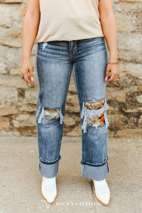 mid washed distressed knee rip camo patch high-rise jeans